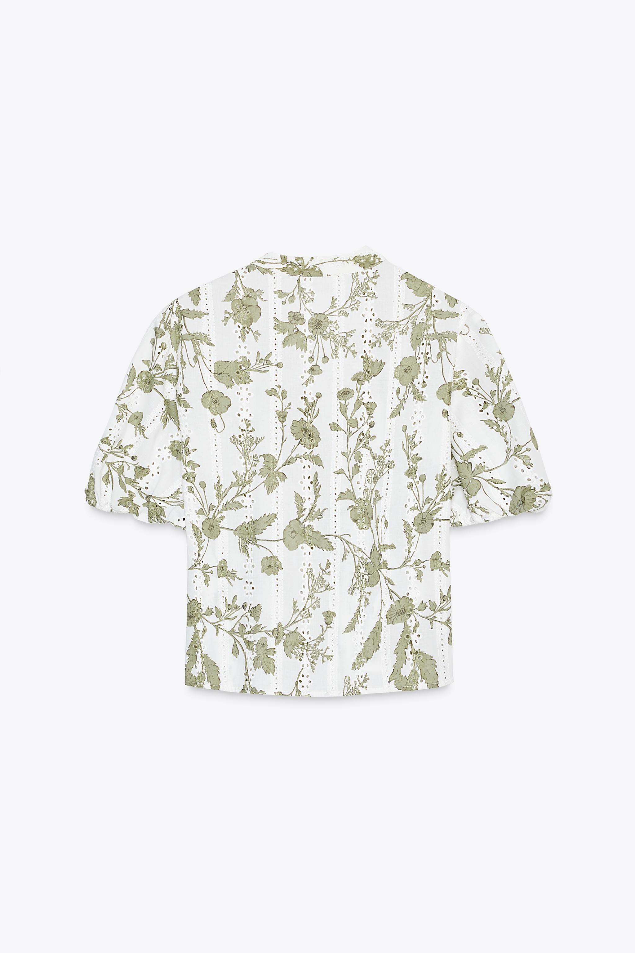 PRINTED TOP WITH EMBROIDERED EYELETS